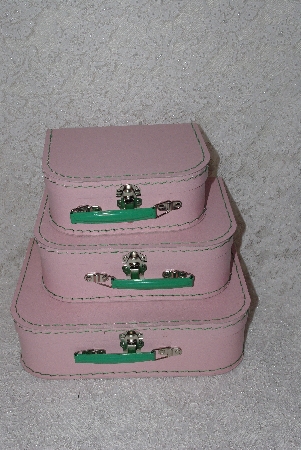 +MBAMG #79-070  "Set Of 3 Pink Nesting Baby Doll Suitcases"