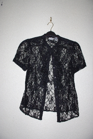 +MBAMG #76-023  "Newport News Black Lace Blouse"