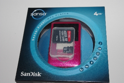 +MBAHB #003-117  " Pink Sansa SanDisk 4GB MP3 Player"