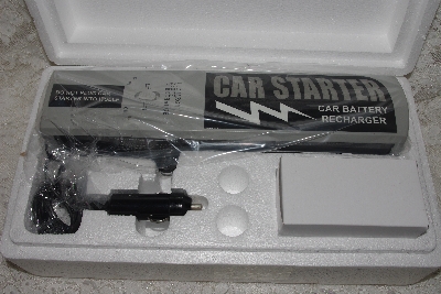 +MBAMG #003-222    "Car Starter Battery Re-Charger With AC Adapter"