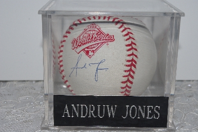 +MBAMG #003-107  "1996 World Series Andruw Jones Autographed Basball In Display Cube"