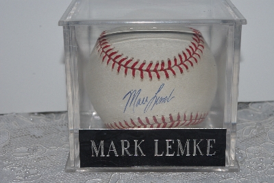 +MBAMG #003-093  "1990's Rawlings "Mark Lemke" Autographed Baseball In Storage Cube"