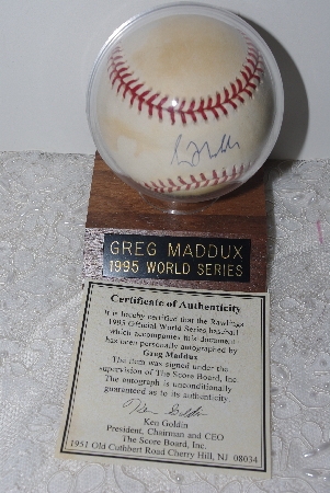 +MBAMG #018-013  "1995 World Series Autographed Greg Maddux Baseball With Holder & Cert"