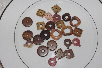 **MBAMG #T06-025  "1980's Set Of 24 Hand Made Bone Buttons"