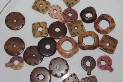 **MBAMG #T06-025  "1980's Set Of 24 Hand Made Bone Buttons"