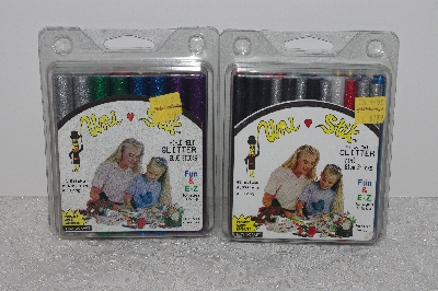 +MBAMG #009-389  "2 Sets Of Uni-Stik Glitter Glue Sticks"