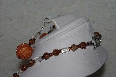 +MBAHB #32-002  "One Of A Kind Orange, Clear & Brown Bead Necklace & Earring Set"
