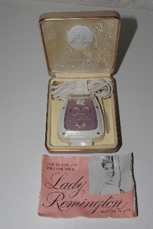 +MBAMG #100-011  "Vintage 1956 Lady Remington Pink Electric Shaver"