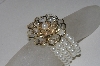 +MBAMG #S99-0077  "4 Strand Floral Stretch Bracelet"