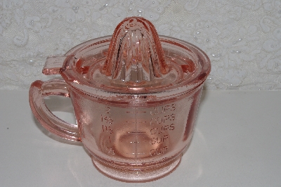 +MBAMG #108-0061  "Reproduction Pink Glass Reamer 3 in 1 Cup"