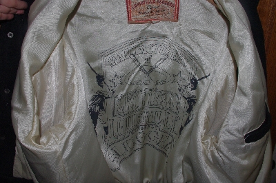 +MBACF #589-0013  "Red & Black Louisville Slugger Baseball Jacket"