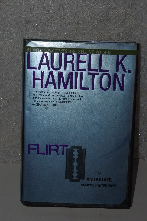 +MBACF #B-0057  "Flirt By Laurell K. Hamilton Hardcover"