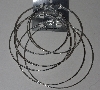 +MBA #1515-0012    Set Of 3 Pairs Large Silver Tone Hoop Pierced Earrings"