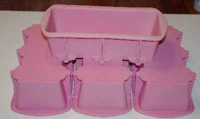 +MBA #1818- 0289    "Set Of 4 Pink Silicone Loaf Pans"