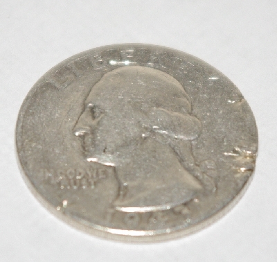 +MBA #1818-0075  "Sterling 1943 Circulated Quarter"