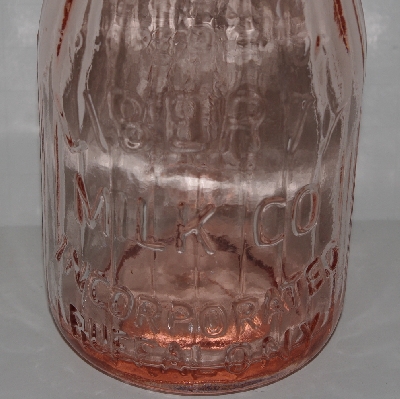 +MBA #2727-0202    "Pink Liberty Milk Company Glass Milk Bottle"