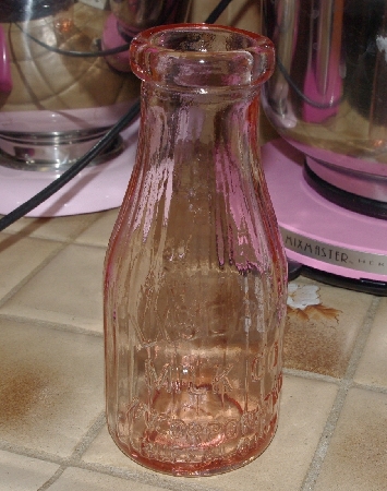 +MBA #2727-0202    "Pink Liberty Milk Company Glass Milk Bottle"