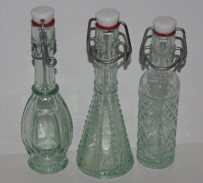 +MBA #2727-476  "1990's Set Of 6 Fancy Mini Clear Glass Bottles With Stoppers"