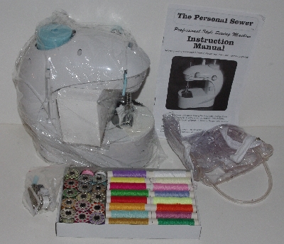 +MBA #3131-874   The Personal Sewer Compact Sewing Machine With 64 Piece Bobbin Kit & Adaptor"