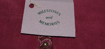 +MBA #3131-0567   "Milestones & Memories Dusty Rose Suede Photo Album"
