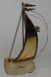 +MBA #3535-1110   "1975 Brass sail Boat Scupture By De Mott"