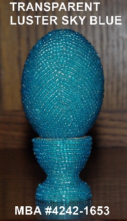 +MBA #4242-1653  "Transparent Luster Syk Blue Glass Seed Bead Egg & Matching Egg Cup"