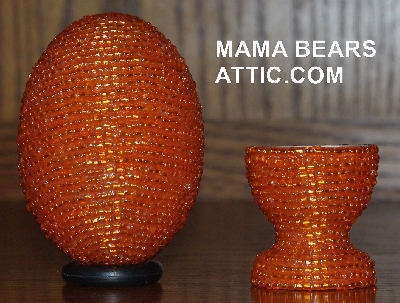 +MBA #4242-1696  "Silver Lined Orange Glass Seed Bead Egg With Matching Egg Cup"
