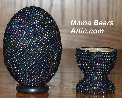 +MBA #5555-0134  "Peacock Black Glass Seed Bead Egg With Matching Egg Cup"