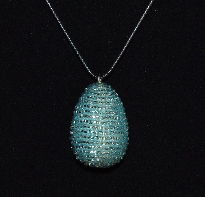 +MBA #EA-0026  "Light Aqua Blue Glass Bead Egg Pendant"