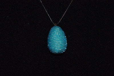+MBA #EA-0082  "Luster Sky Blue Glass Seed Bead Egg Pendant"