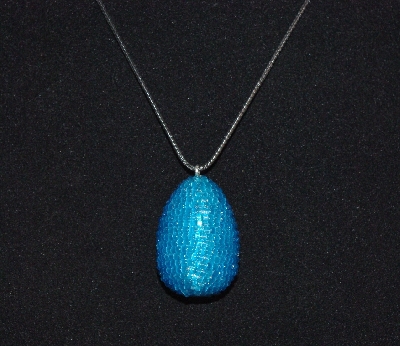 +MBA #EA-0118  "Frosted Sky Blue Seed Bead Egg Pendant"