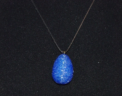 +MBA #EA-0179  "2 Cut Blue Glass Bead Egg Pendant"