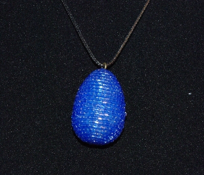 +MBA #EA-0179  "2 Cut Blue Glass Bead Egg Pendant"