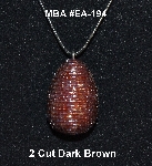 +MBA #EA-194  "2 Cut Brown Glass Seed Bead Egg Pendant"
