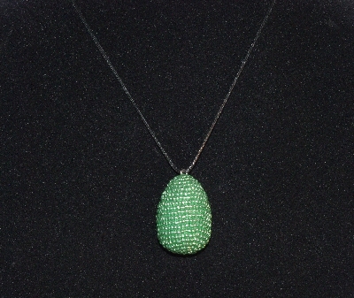 +MBA #EA-237  "Metallic Green Glass Seed Bead Egg Pendant"