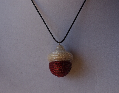 +MBA #AC1-0084  "Clear Luster & Ruby Red Glass Seed Bead Acorn Pendant"