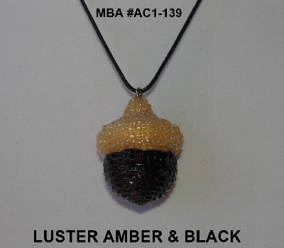 +MBA #AC1-139  "Luster Amber & Black Glass Seed Bead Acorn Pendant"