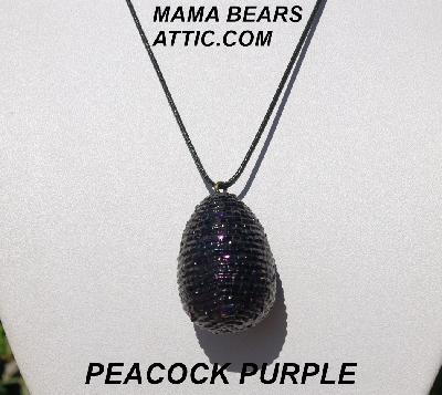 +MBA #5557-0078  "Deep  Peacock Purple Glass Seed Bead Egg Pendant"