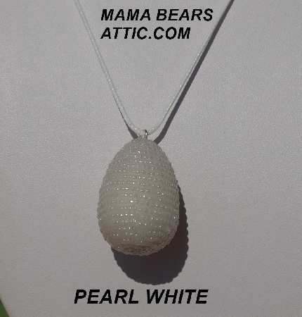 +MBA #5557-0084  "Pearl White Glass Seed Bead Egg Pendant"