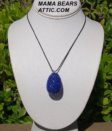 +MBA #5555-0091  "Silver Lined Blue Glass Seed Bead Egg Pendant"