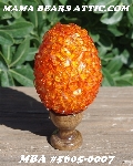 +MBA #5605-0007  "Orange Glass Rock Chip Bead Egg With Stand"