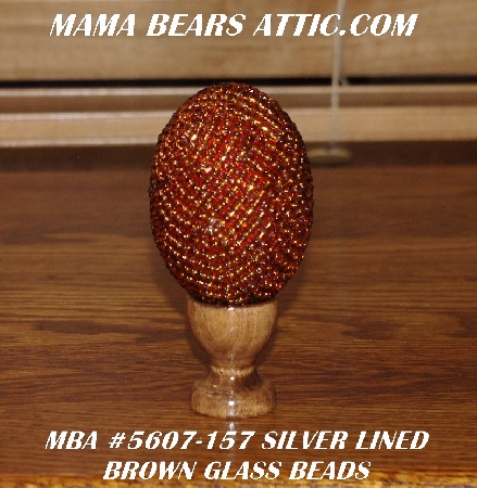 +MBA #5607-157  "Silver Lined Brown Glass Bead Egg With Stand"