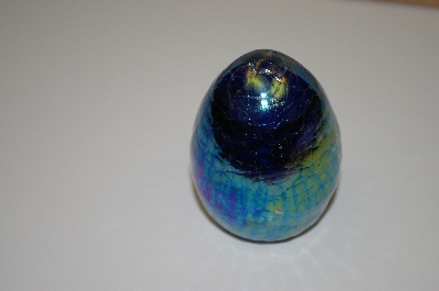 +MBA #10-077  Blue Glass Opalescent Hand Crafted Egg