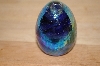 +MBA #10-077  Blue Glass Opalescent Hand Crafted Egg