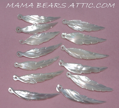 +MBA #5608-117   "Set Of 13 Hand Cut & Carved Mother Of Pearl Feathers"