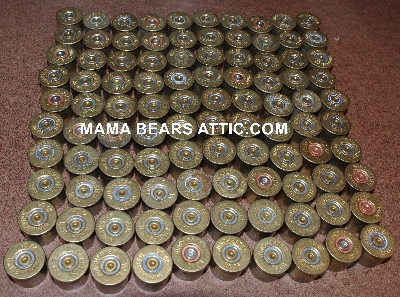 MBA #5623-1251   "(100) 28 Gauge Winchester Brass Head Stamps"