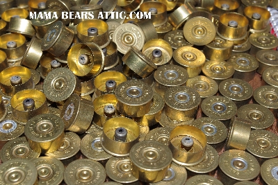 MBA #5623-1257  "1990's (50) Remington Peters Brass 20 Gauge Head Stamps"