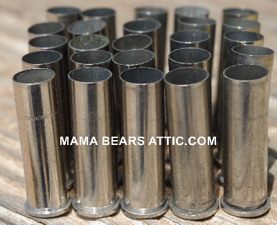 MBA #5626B-1989  "1990's Set Of (25) S&W 357 Magnum Nickel Spent Shell Casings"