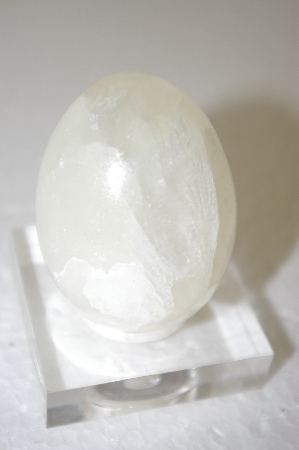 +MBA #11-172  White Quartz Hand Cut & Polished Egg