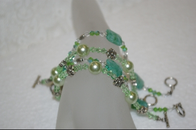 +  Set Of 4 Green Beaded Bracelets